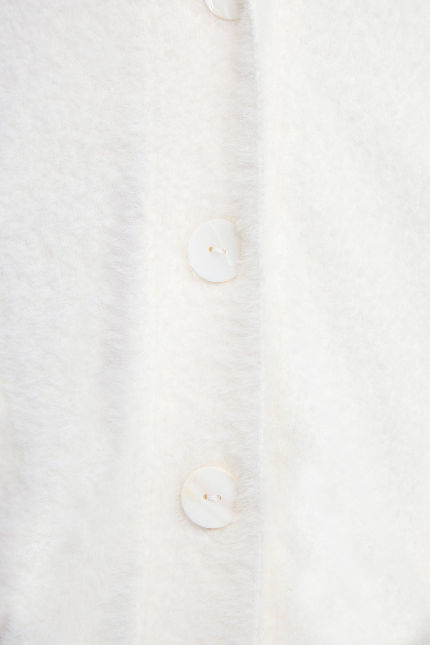 « LE CARDIGAN »
